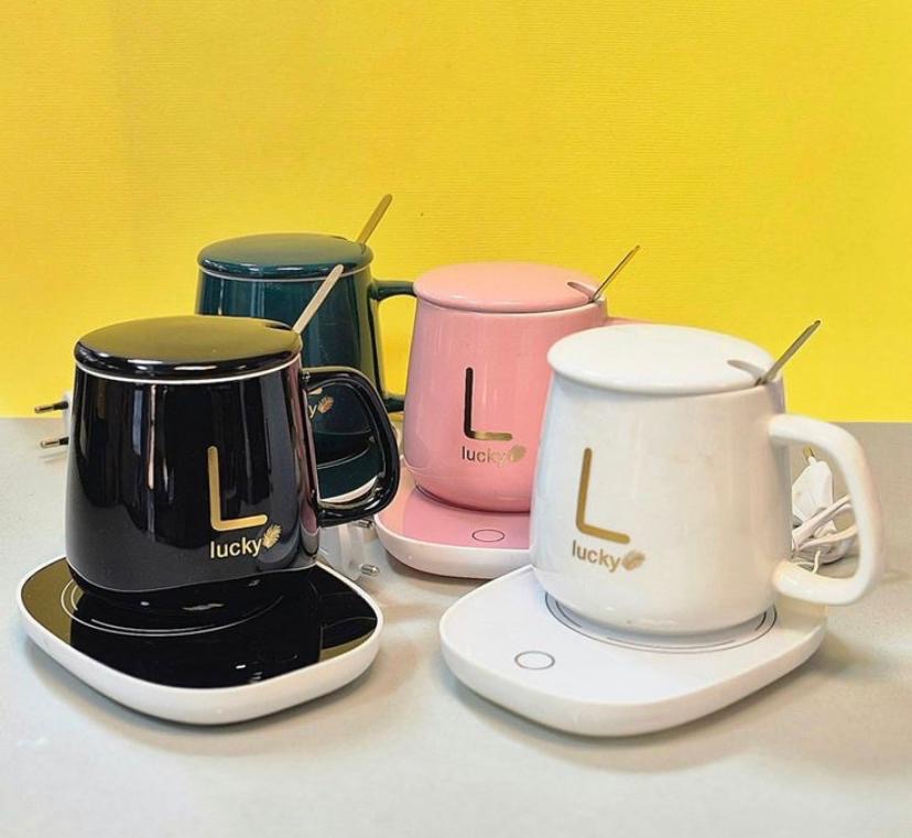 ماگ سرامیکی گرم کن دار حرارتی همراه صفحه ی حرارتی وارداتی اصل غذا گرم کن و نوشیدنی گرم کن مسافرتی برقی همراه با صفحه ی حرارتی مناسب مسافرت و کمپ و خانه و محل کار و روی میز منسب همه و همه کاره حتی غذا گرم کن قیمت اقتصادی